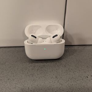 SOLD: Apple White Wireless Earbuds with Charging Case